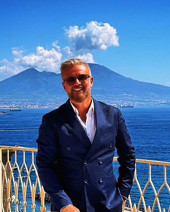 Fabio Valenziano in Naples, with Mount Vesuvius behind